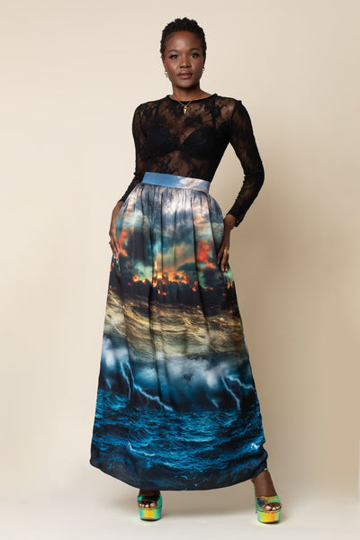 Front view of fully lined signature chaos printed maxi skirt. This easy maxi style full length skirt features center back invisible zipper closure, invisible pockets, and is fully lined.