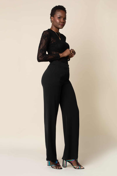 Elegant and stylish wide leg, curve accentuating black pant with a high waist, real deep pockets and a comfortable light weight polyester fabric.