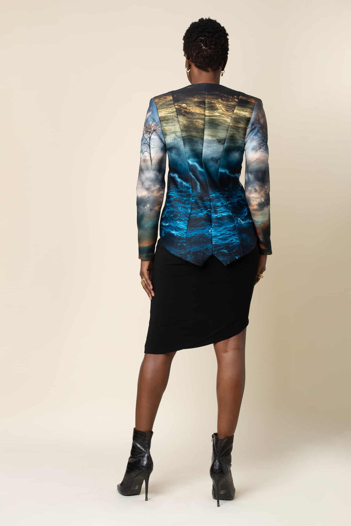 Full back view of unique scuba back giving a chance to appreciate a detailed print that feature deep blue water.