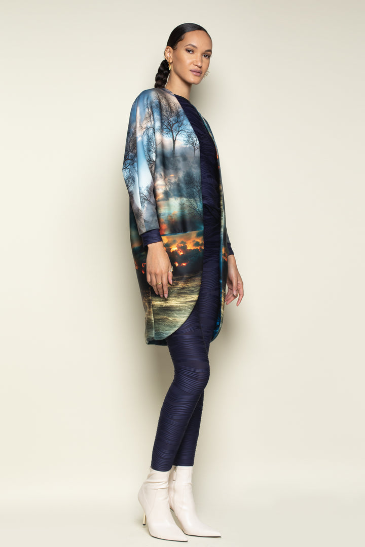 Left Side View Profile Showcasing Rounded Hemline and Three Quarter Sleeve Length. Showcasing more about the Print Quality