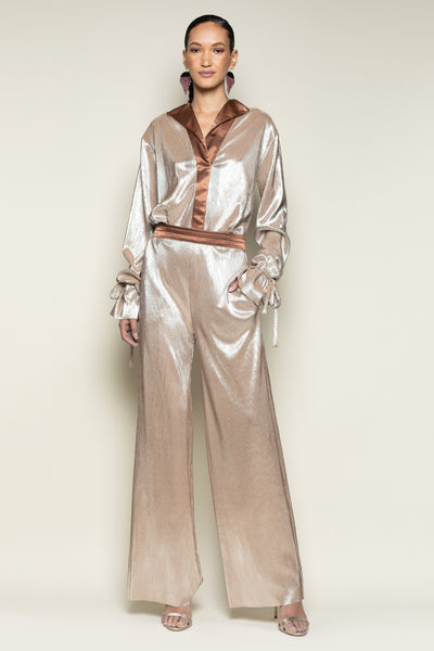 Front view of 100% polyester rose gold pleated and wide leg tuxedo style pant with comfortable deep rose gold waist band and deep side pockets.